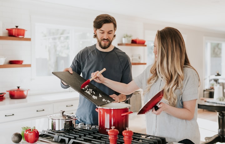 Happy couple in a bright, well-kept kitchen